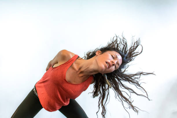 istock Healthy woman during flowing yoga class 1197576232