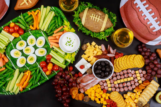 party table for watching american football game. - lanche da tarde imagens e fotografias de stock