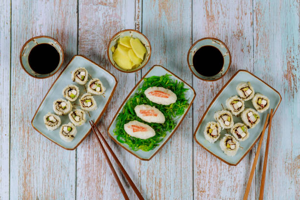 istock Set of sushi roll with soy sauce, ginger and chopstick. 1197580005