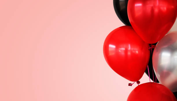 istock colorful balloons on pink background 1197586279