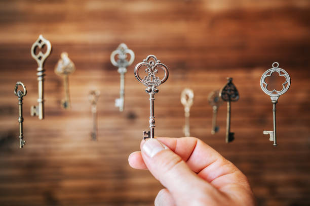 Choosing the right key, metaphorical to make right decisions Choosing the right key, metaphorical to make right decisions. antique key stock pictures, royalty-free photos & images