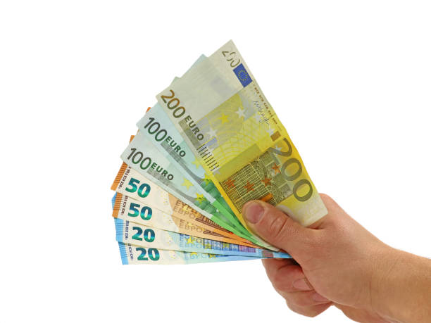 istock male hand with euro banknotes isolated on white background 1197594510
