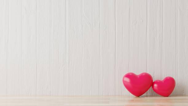 istock Red heart in white room. 1197594710