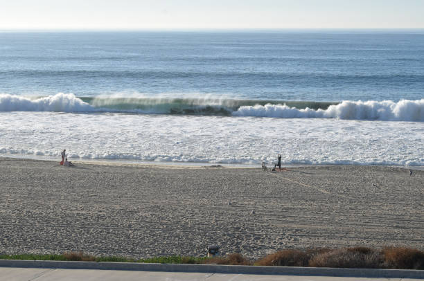 Doing Yoga near the Waves on the Beach