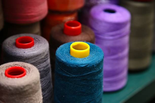istock Colorful cotton thread inside a fabric store. Fashion design concept image. 1197600906