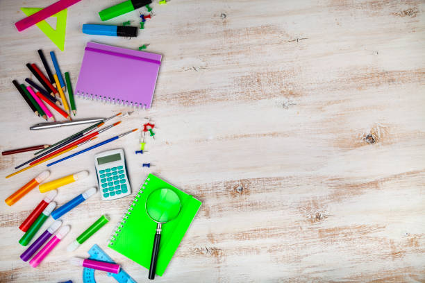 istock Items for the school on a wooden table. 1197605406