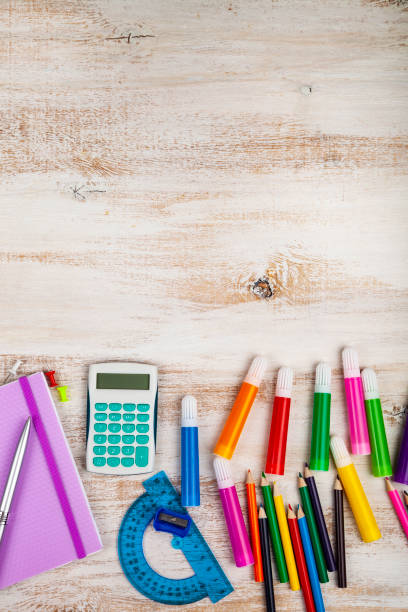 istock Items for the school on a wooden table. 1197605565