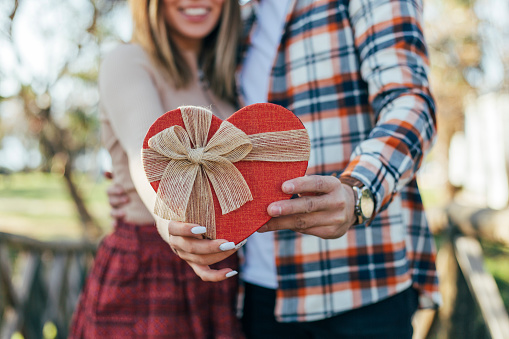 Man Giving Present to Woman
