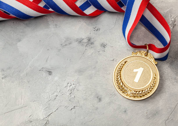 istock Gold medal. First place award with ribbon 1197606711