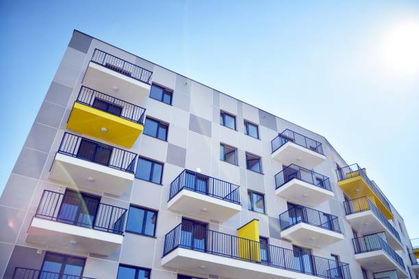 istock Modern apartment buildings on a sunny day with a blue sky. 1197607782