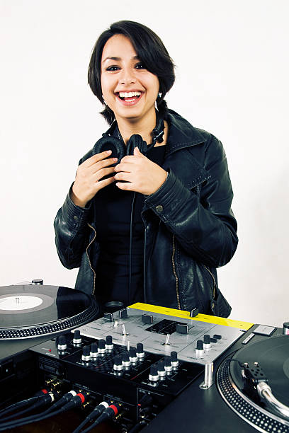 istock Female DJ at the turntables 119760828