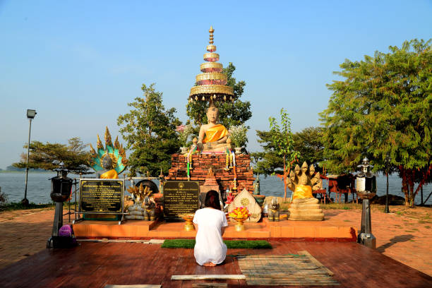 Phayao, Thailand  21 December, 2019 : Wat Tilok Aram : Year-Old Underwater Temple of Thailand, Today a floating platform with the statue of a Buddha sits directly above the site of the sunken temple.