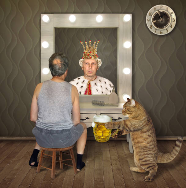 istock Man and cat with beer 1197613220