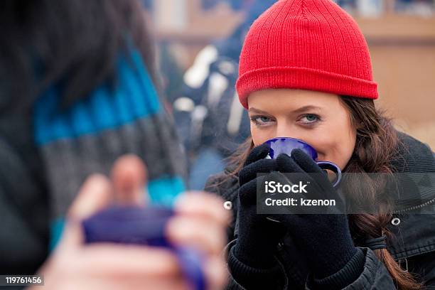 Women On Christmas Market Drinking Punch Stock Photo - Download Image Now - Adult, Adults Only, Alcohol - Drink