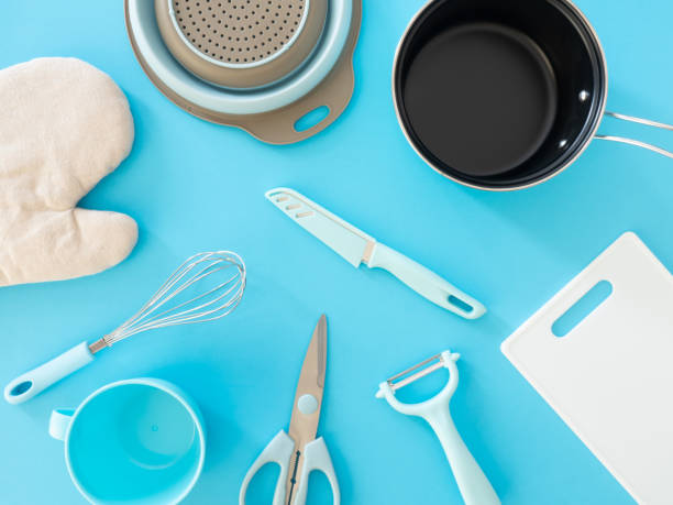 istock top view of kitchen room concept with kitchenware on blue table background. 1197614623