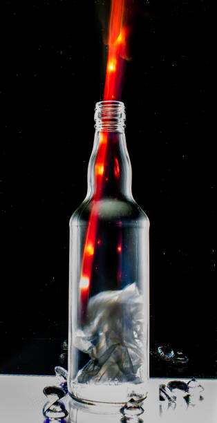 istock glass bottle in the foreground framed by light painting 1197615667