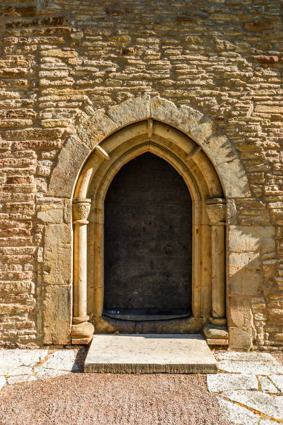 istock Old church door with a vaulted arch 1197619440