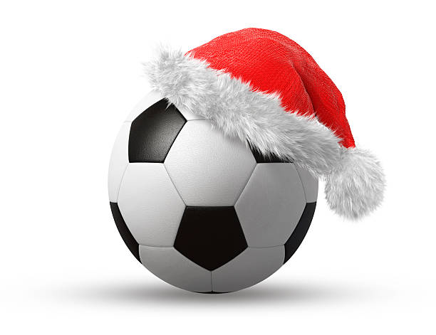 chapéu de papai noel em uma bola de futebol - santa hat fotos - fotografias e filmes do acervo