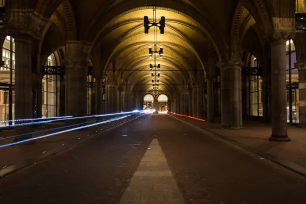 Photo of Bicycle passage in Amsterdam city center with bike light trails