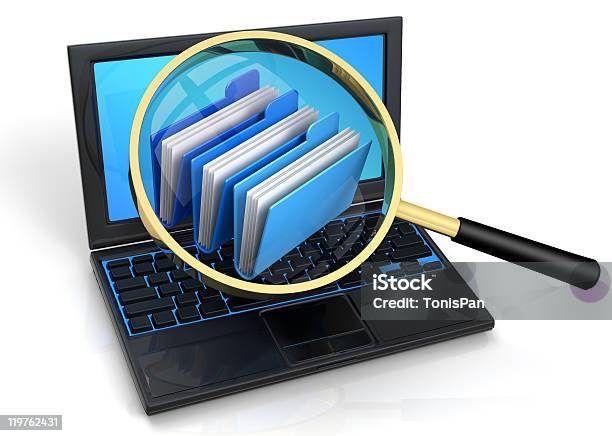 Folders On Laptop Viewed Through Magnifying Glass Stock Photo - Download Image Now - File Folder, Searching, Computer Monitor