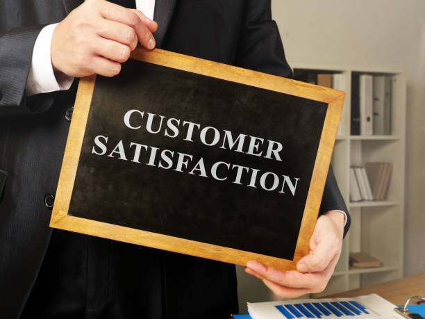 istock Customer satisfaction sign on the blackboard. 1197632233