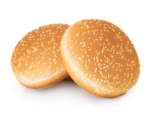 istock Two hamburger buns with sesame isolated on white background. 1197633537