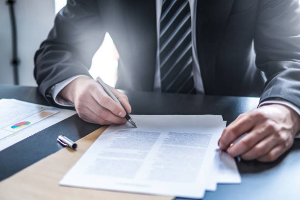 istock Business man signing contract, making a deal. 1197640001