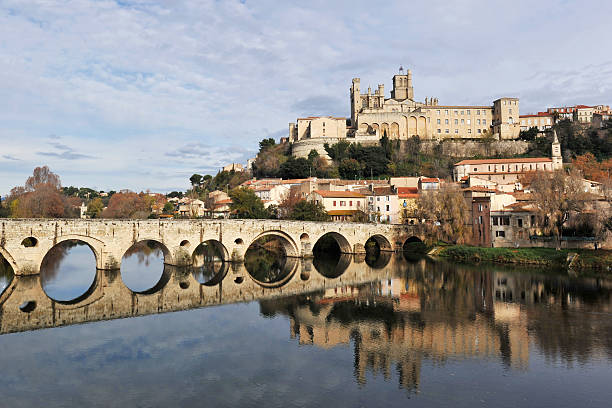 istock Beziers cathedral and old bridge 119764080