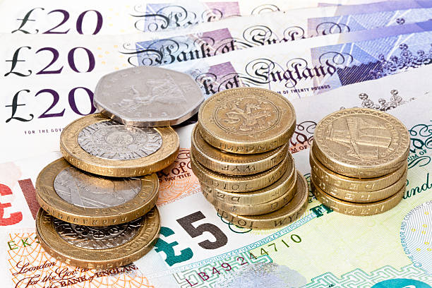 brytyjska waluta monety i uwagi - heap currency british pounds stack zdjęcia i obrazy z banku zdjęć