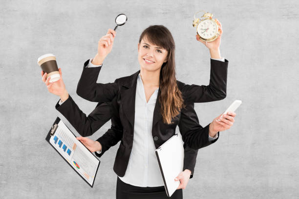 istock Multitask business woman with many hands. 1197641288