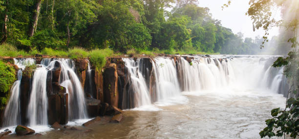istock Picturesque Tad Pha Suam Waterfall at sunrise. 1197643273