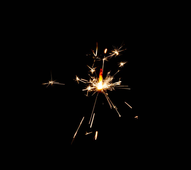 istock Burning sparkler isolated on black background 1197643511