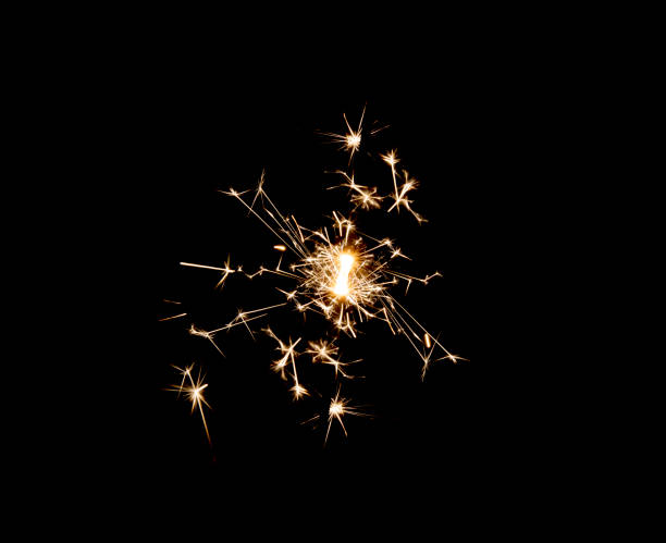 istock Burning sparkler isolated on black background 1197643513