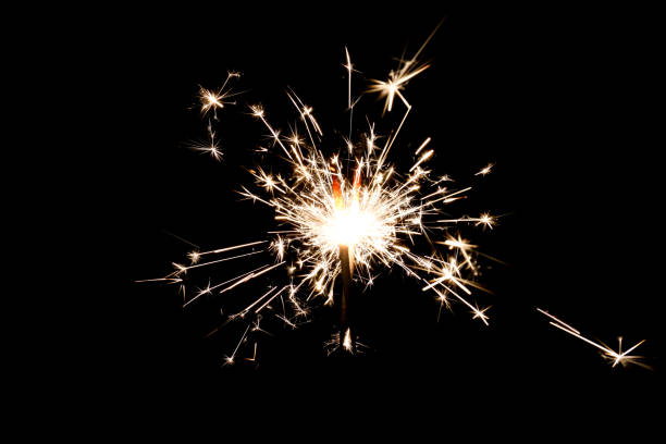 istock Burning sparkler isolated on black background 1197643537