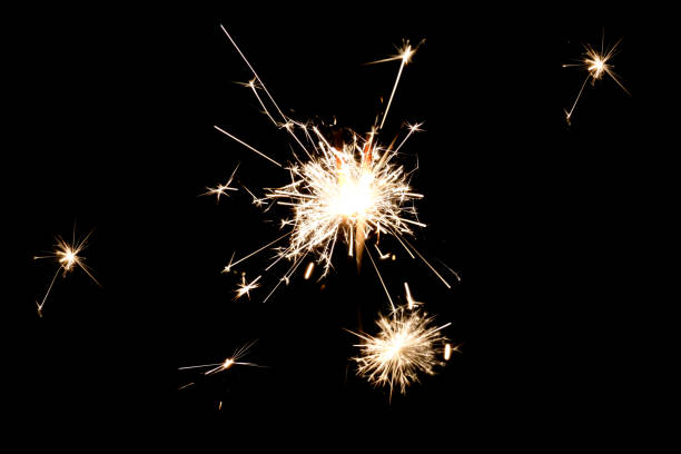 istock Burning sparkler isolated on black background 1197643538