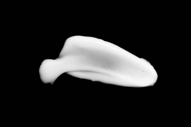 istock cosmetic cream isolated on a black background 1197643744