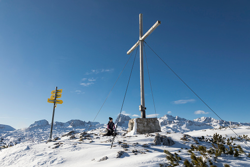 A female hiker is resting at the so called Helbronner Kreuz (1.959 mt., 6.427 ft.) in the Dachstein-Krippenstein region, Austria.
Canon EOS 5D Mark IV, 1/320, f/16, 28 mm.