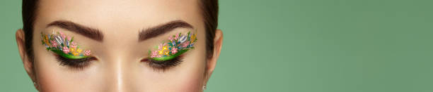 istock Eye makeup girl with a flowers 1197644627