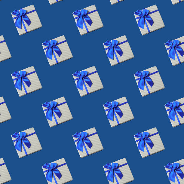 istock Seamless Pattern made with gift box over trendy classic blue color background. 1197646381