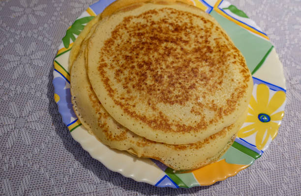 istock A stack of pancakes cooked at home. On the plate. Top view 1197647461