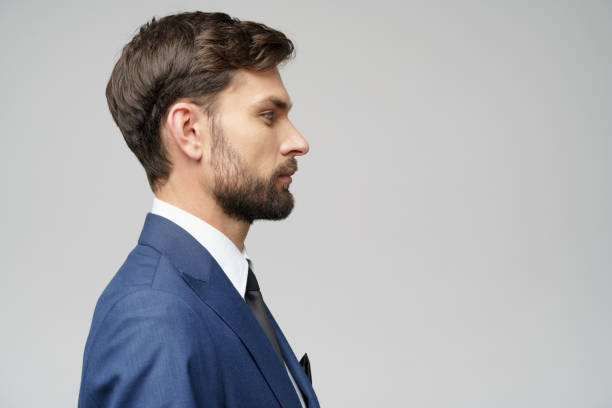 istock Studuo shot of thinking businessman wearing suit 1197648480