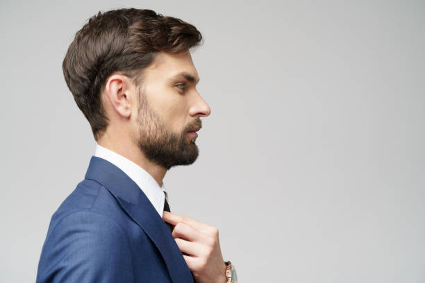 istock Studuo shot of thinking businessman wearing suit 1197648486