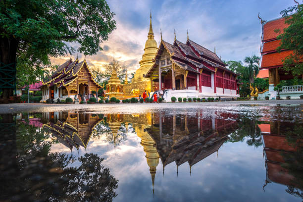 wat phra singh is a buddhist temple is a major tourist attraction in chiang mai,thailand. - gold pagoda temple synagogue imagens e fotografias de stock