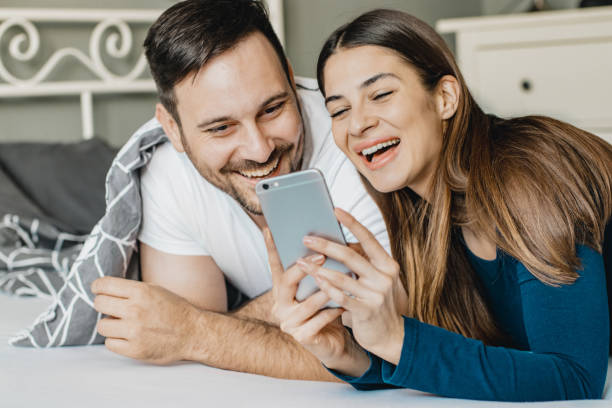 istock Young couple in bed 1197652590