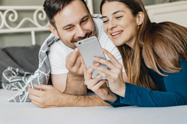 istock Young couple in bed 1197652599