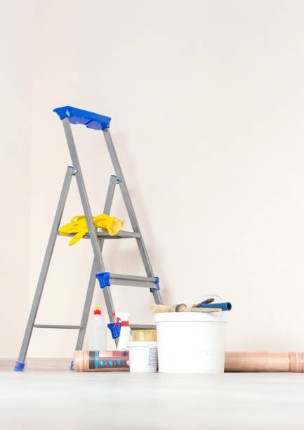 istock a stepladder with paint cans and tools in a bright renovated room 1197652630