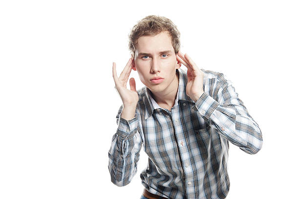 istock studio portrait of young handsome man over white 119765360