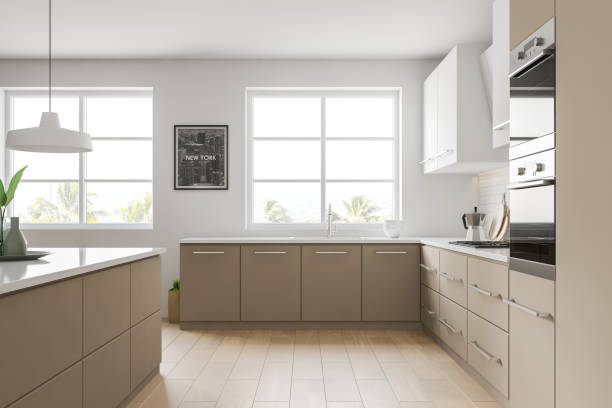 istock Side view of white and beige kitchen with picture 1197653992