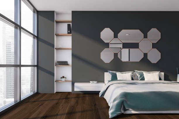istock Gray master bedroom with mirrors and shelves 1197654349