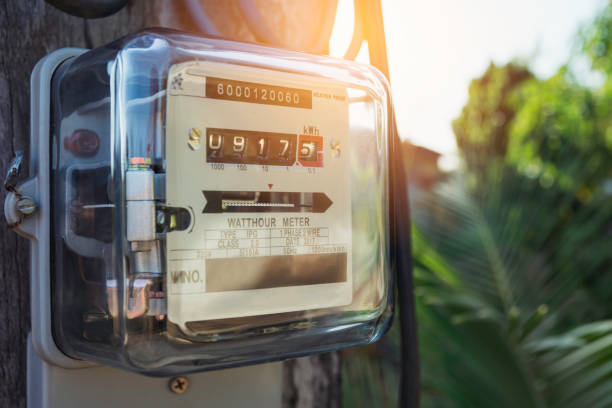 istock Electric power meter measuring power usage. Watt hour electric meter measurement tool with copy space. 1197657095